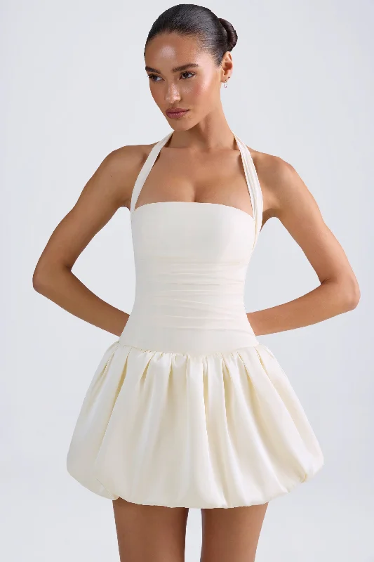 Denim mini dresses with distressed details Halterneck Lace-Up Bubble Hem Corset Micro Mini Dress in Ivory Denim mini dresses with distressed details Halterneck Lace-Up Bubble Hem Corset Micro Mini Dress in Ivory