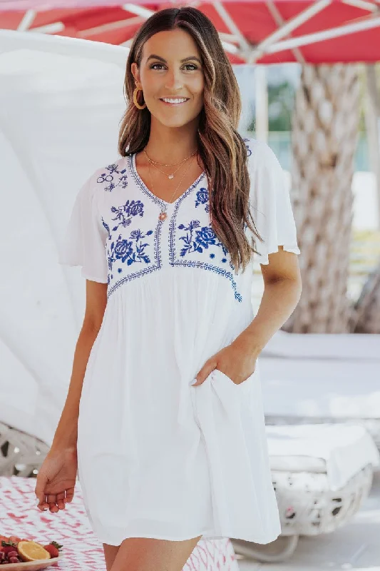 Mini dresses with pleated skirts for a classic look Seaside Blue Embroidered White Mini Dress Mini dresses with pleated skirts for a classic look Seaside Blue Embroidered White Mini Dress