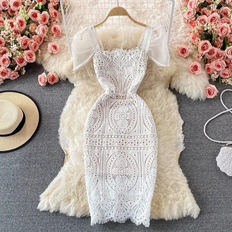 Midi dresses with ruffled bodices for a more pronounced feminine look Jane Eyelet Dress Midi dresses with ruffled bodices for a more pronounced feminine look Jane Eyelet Dress