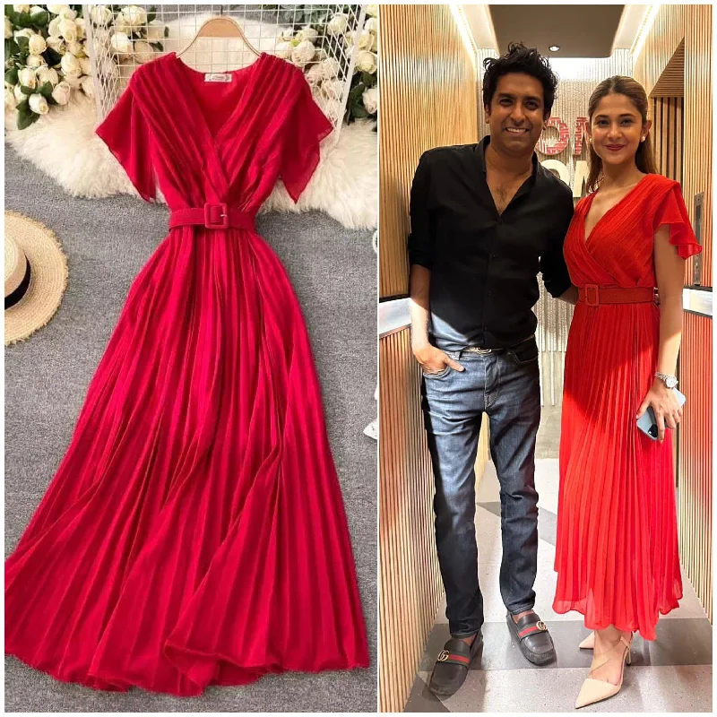 Midi dresses with gathered skirts for a full and flowing silhouette Parota Statement Dress Midi dresses with gathered skirts for a full and flowing silhouette Parota Statement Dress