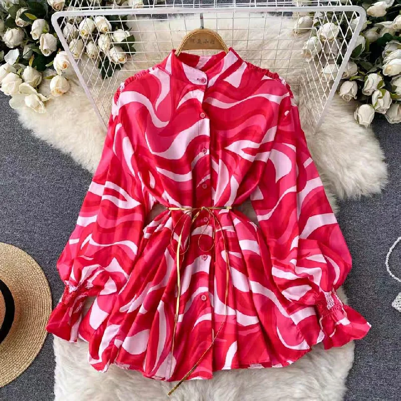 Mini dresses with ribbed textures for a unique appearance Abstract Statement Dress