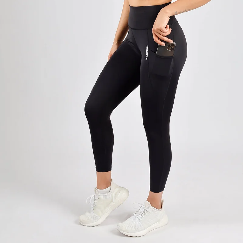Women's High - Waisted Tight Trousers with Side Slits in Beige for a Trendy LookBreeze Pocket Leggings 7/8 Women's High - Waisted Tight Trousers with Side Slits in Beige for a Trendy LookBreeze Pocket Leggings 7/8