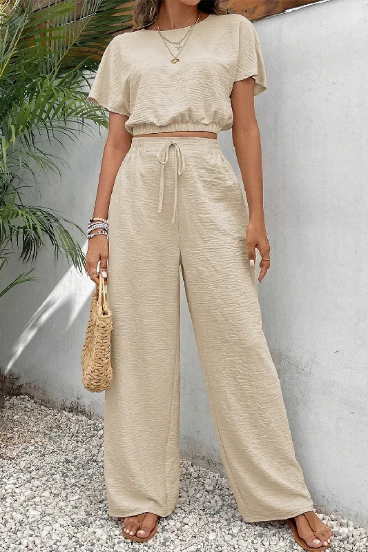 Ruffled Bodysuits with a Playful and Feminine TouchRound Neck Short Sleeve Top and Pants Set Ruffled Bodysuits with a Playful and Feminine TouchRound Neck Short Sleeve Top and Pants Set
